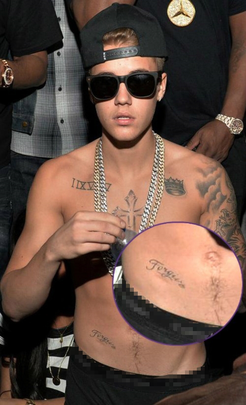 Lời xin lỗi dành cho fan được Justin thể hiện qua hình xăm "Forgive". (Ảnh: Internet)