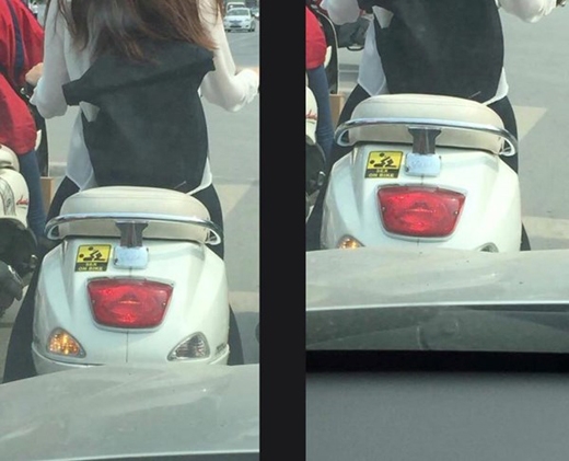 
	
	Cô gái dán logo độc trên xe máy gây xôn xao.