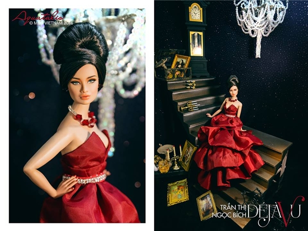 
Thí sinh Trần Thị Ngọc Bích diện chiếc đầm phân tầng có tông đỏ rượu chát quyến rũ. Cô nàng được trang điểm, làm tóc theo phong cách cổ điển sang trọng.