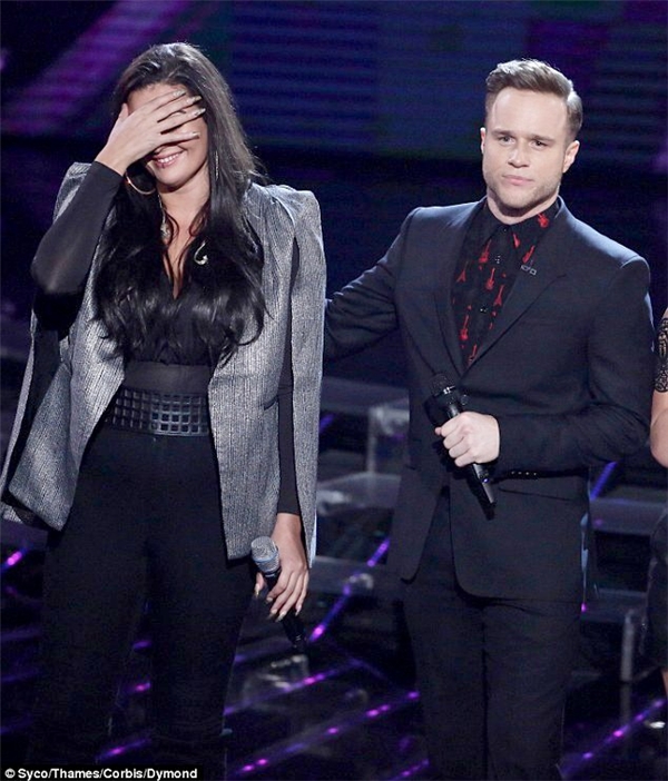 
Olly Murs (phải) và Monica Michael trên sân khấu X Factor. Ảnh:Syco/Thames/Corbis/Dymond