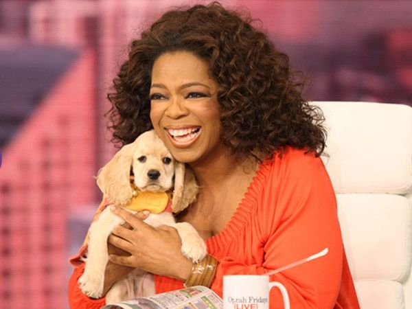  Oprah Winfrey cùng chú chó cưng. (Ảnh: Internet)